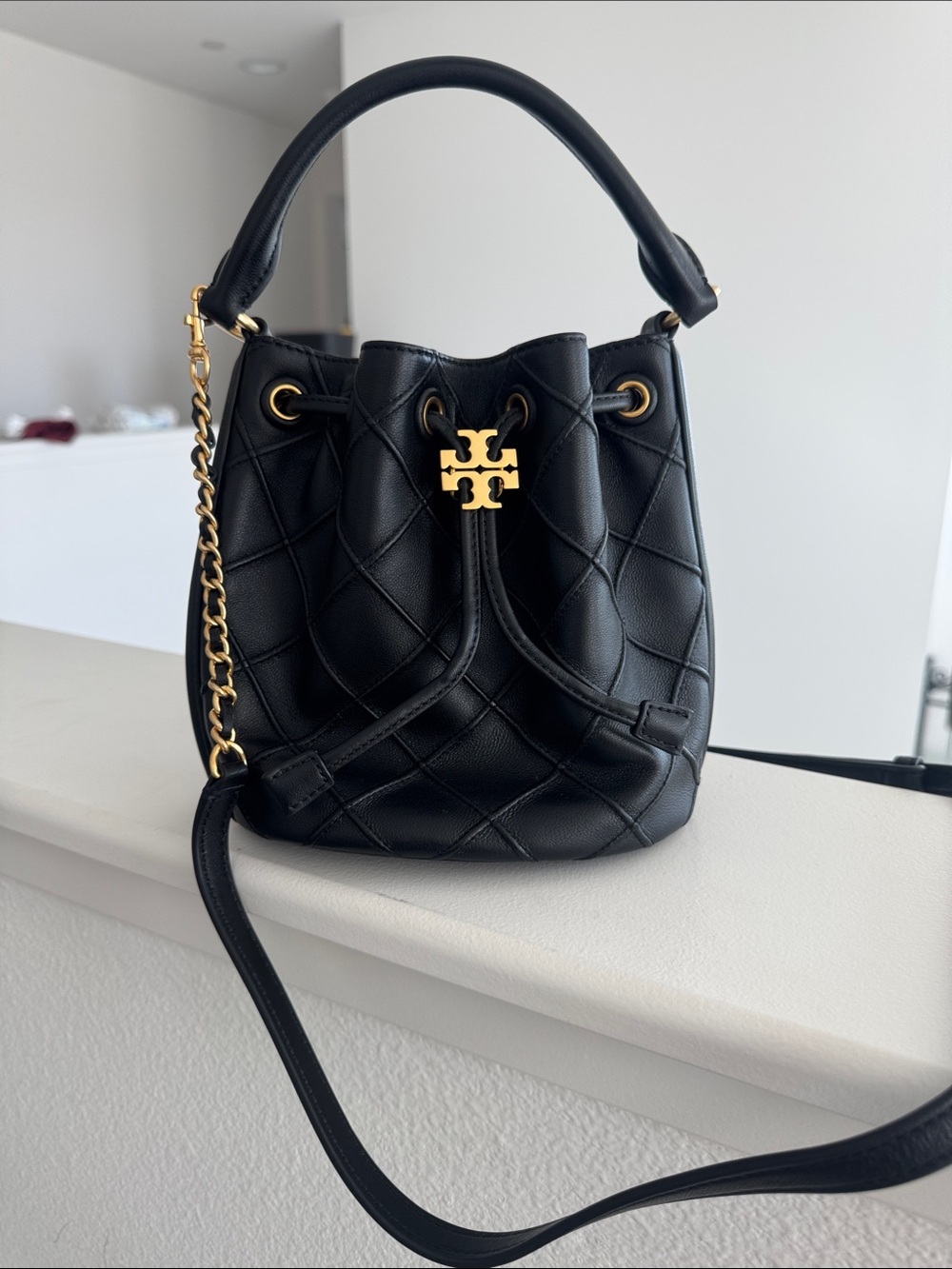 Tory Burch Black Quilted Leather Mini Drawstring Bucket Bag with Gold Hardware - Picture 2 of 5